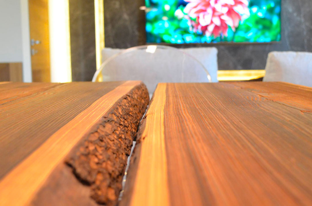 Sliced  wooden table with bark