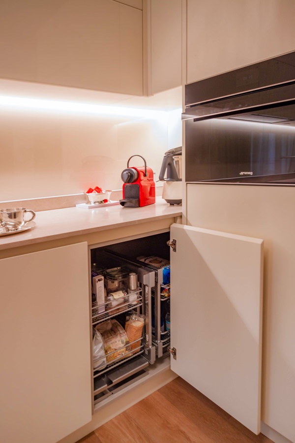 cream-colored kitchen corner door internal basket closed position