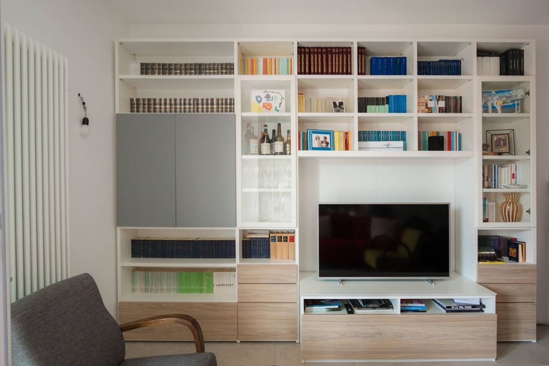 living area TV cabinet in front of wooden laminate drawers