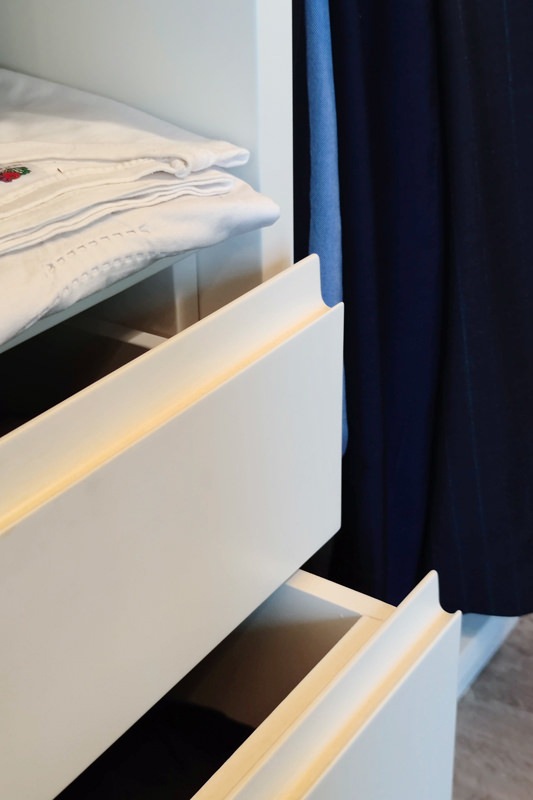 detail handles hollow linen drawers walk-in closet rear bed