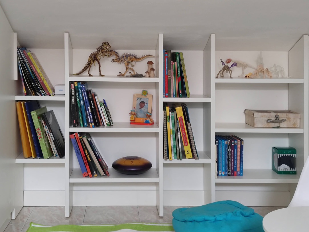 attic bookcase with fixed shelves