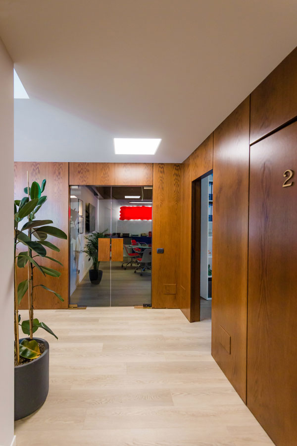 full height cherry wood paneling entrance