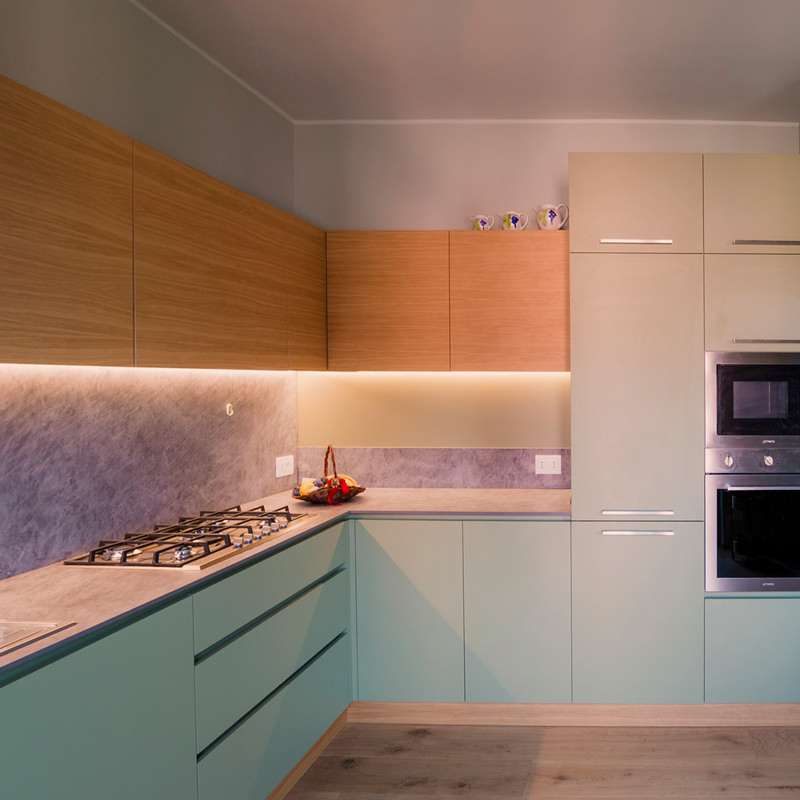 AN OLIVE GREEN KITCHEN IN THE OROBIC PREALPS