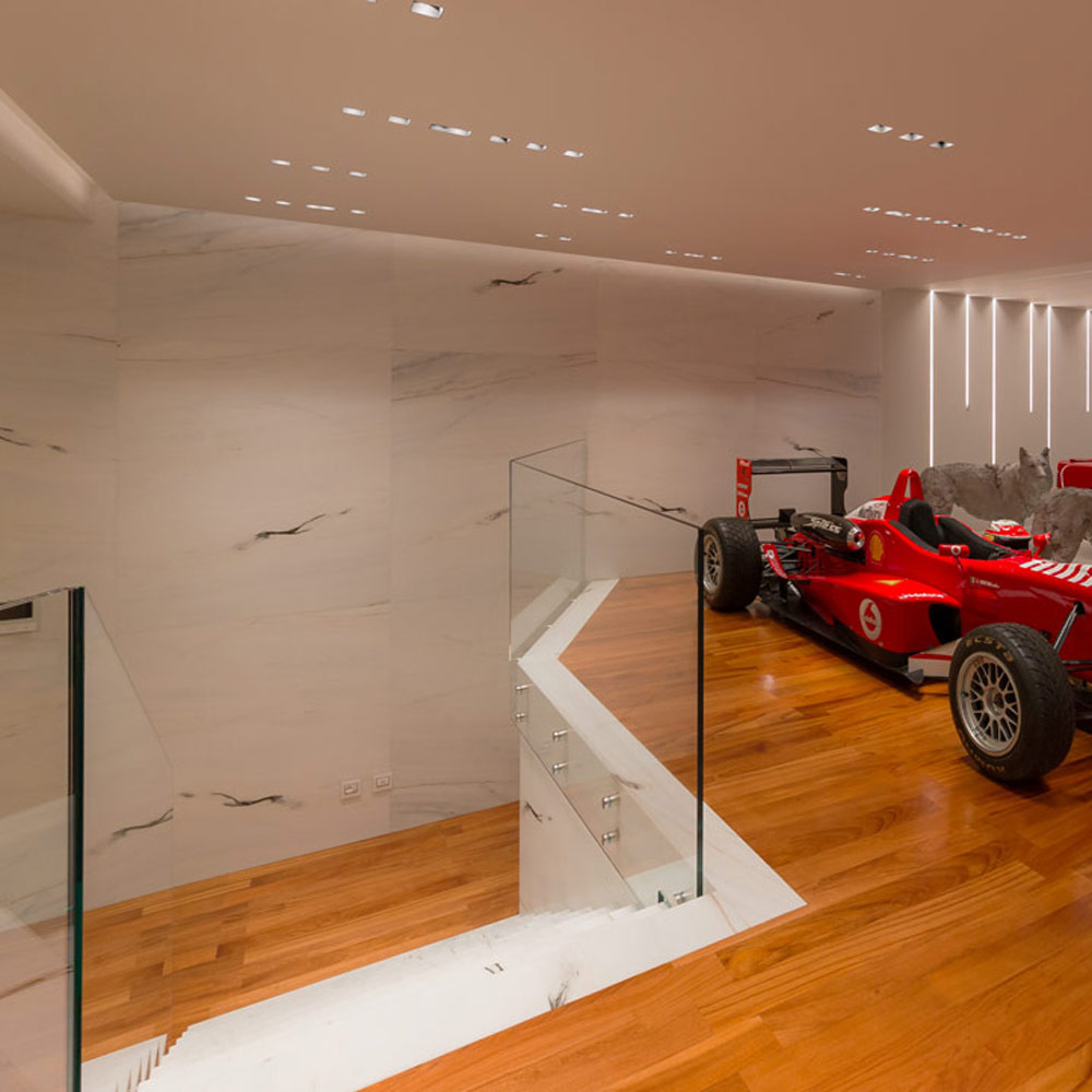 The Elegance of the Garage in a Fusion of Collecting and Modern Interior Design